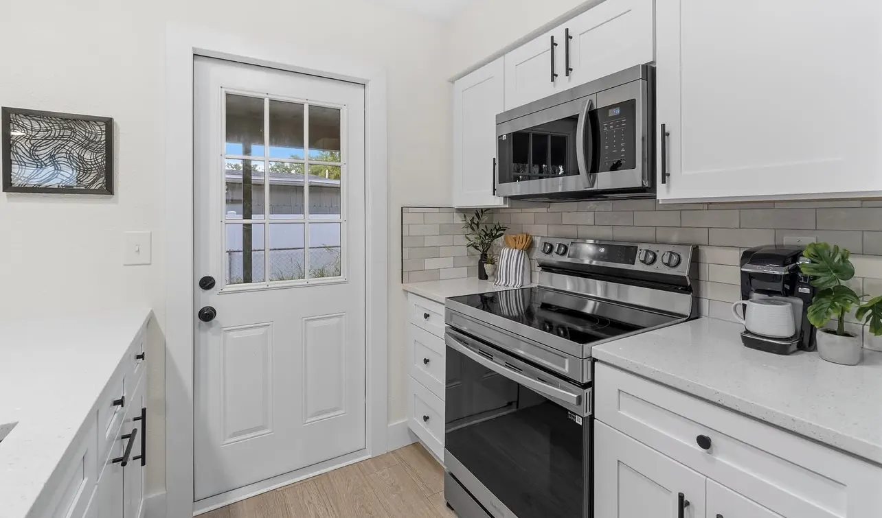 White shaker kitchen remodel by CWL Construction